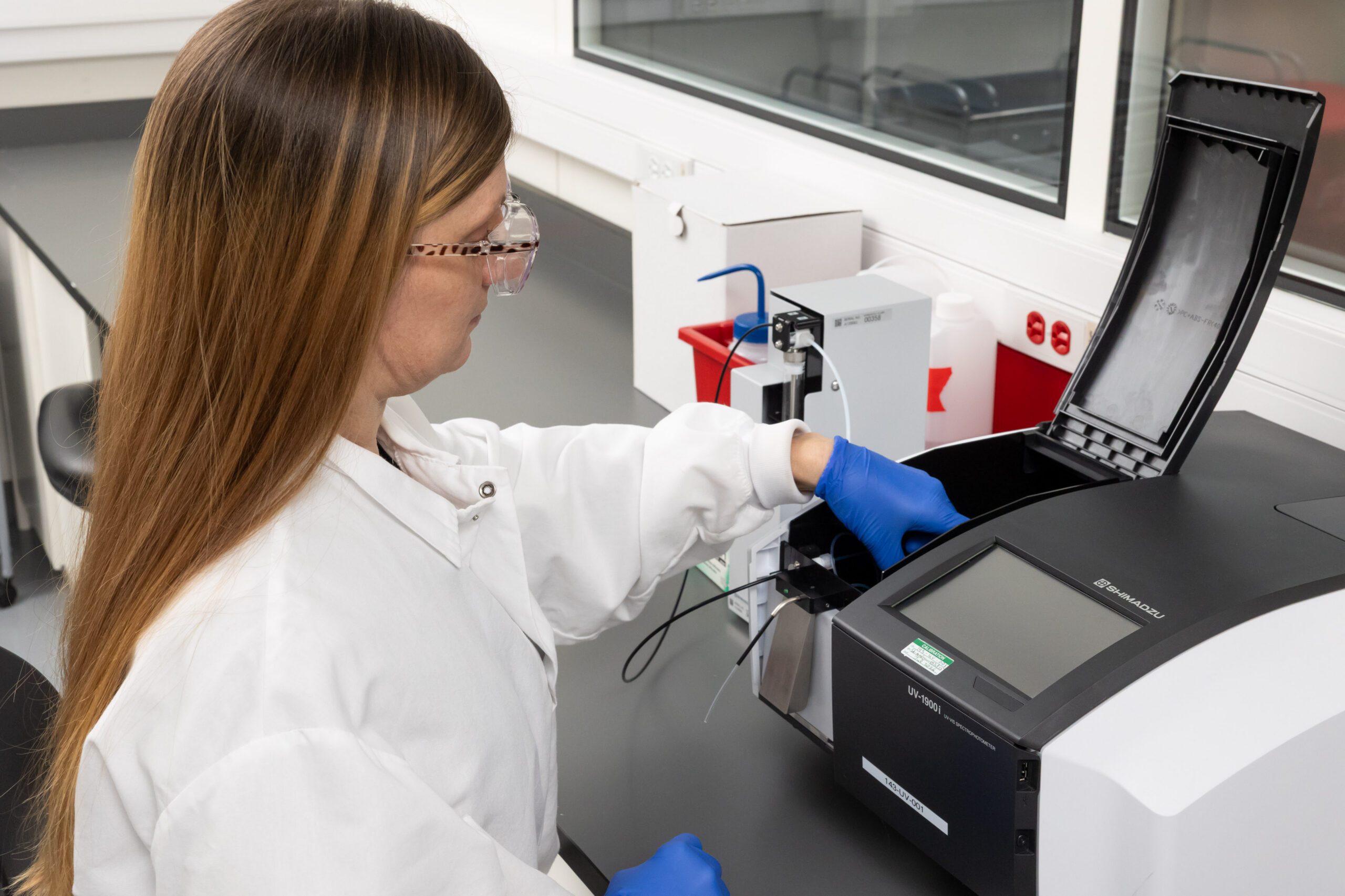 Scientist performing analytical testing for topical and transdermal drug products