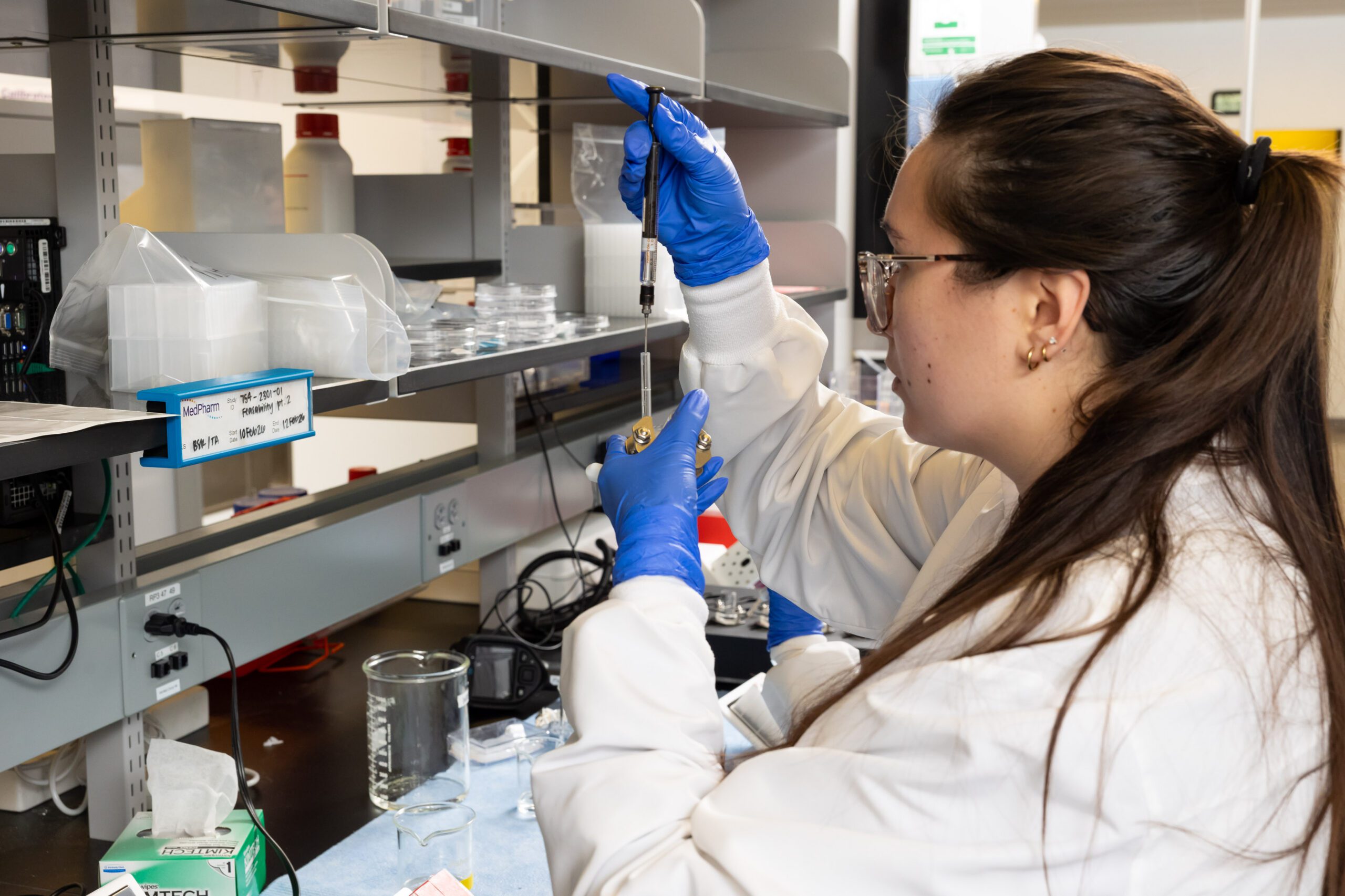Scientist performing in vitro release testing (IVRT) for topical and semisolid drug products in pharmaceutical laboratory